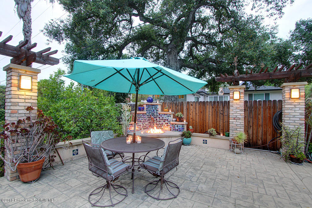 3775 Shadow Grove Road Pasadena, CA 91107 - Photo 19 of 33 a view of backyard with seating space and trees