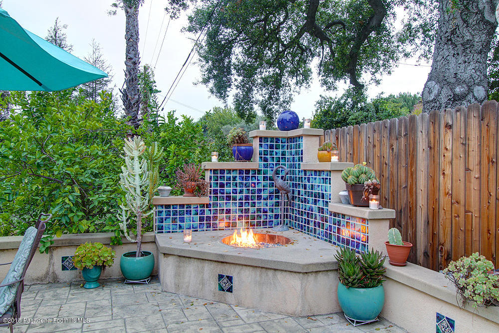 3775 Shadow Grove Road Pasadena, CA 91107 - Photo 21 of 33 a view of a balcony with chairs potted plants