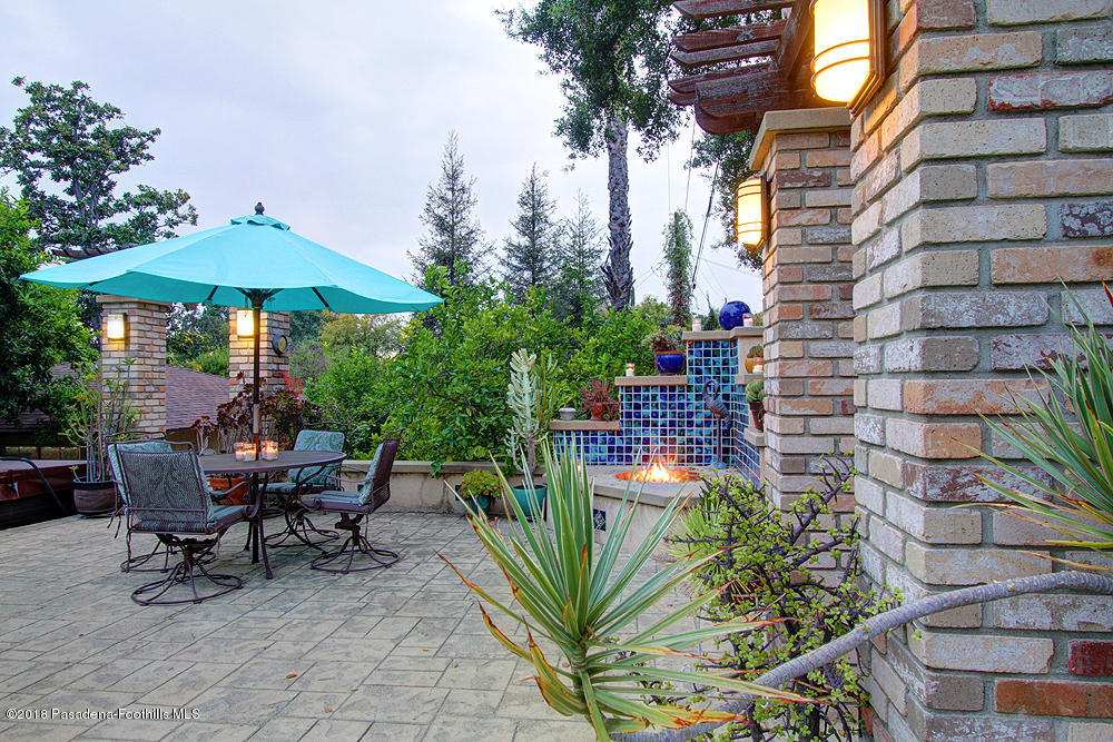 3775 Shadow Grove Road Pasadena, CA 91107 - Photo 22 of 33 a view of a backyard with plants and a patio