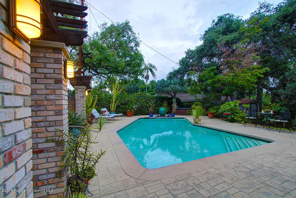3775 Shadow Grove Road Pasadena, CA 91107 - Photo 23 of 33 a view of a swimming pool with a patio