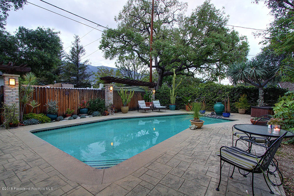 3775 Shadow Grove Road Pasadena, CA 91107 - Photo 24 of 33 a view of a swimming pool with a patio
