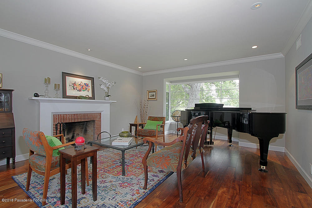 3775 Shadow Grove Road Pasadena, CA 91107 - Photo 6 of 33 a living room with furniture and a fireplace