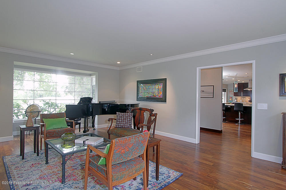 3775 Shadow Grove Road Pasadena, CA 91107 - Photo 7 of 33 a living room with fireplace furniture and a large window