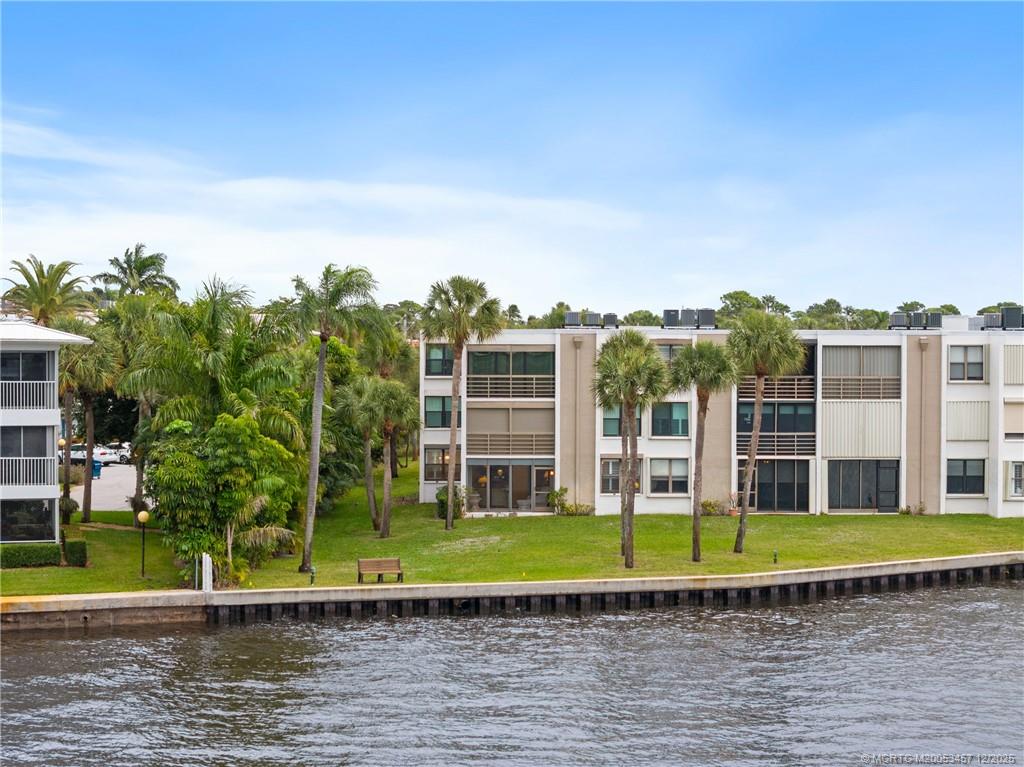 a view of a house with a big yard
