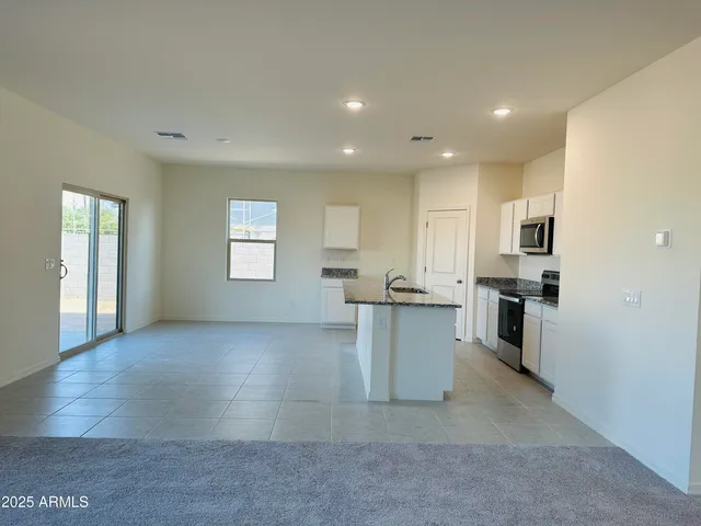 a view of an empty room with window