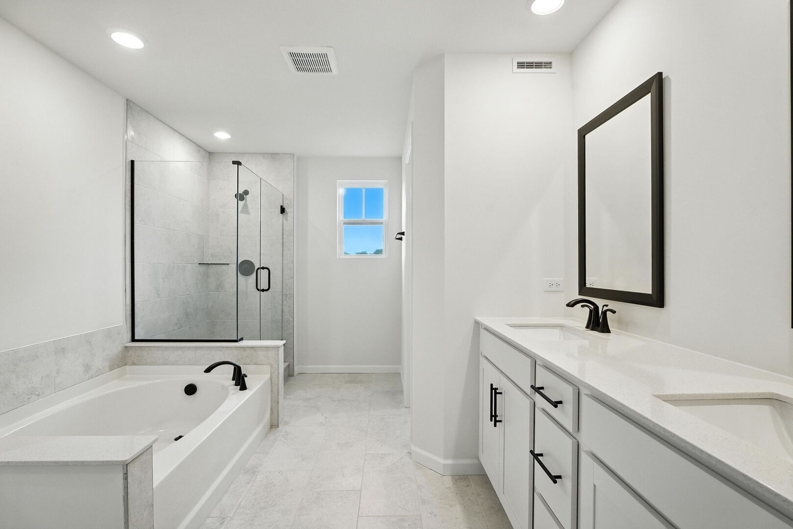 1062 Houston Street, Unit 74004 Batavia, IL 60510 - Photo 16 of 23 a bathroom with a double vanity sink mirror double and bathtub