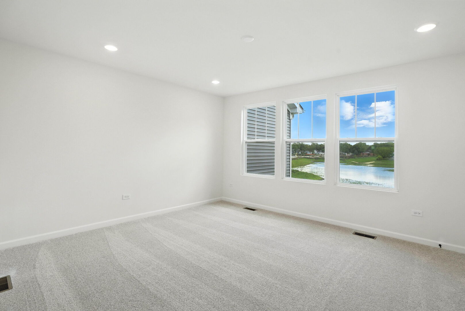 1062 Houston Street, Unit 74004 Batavia, IL 60510 - Photo 18 of 23 an empty room with windows