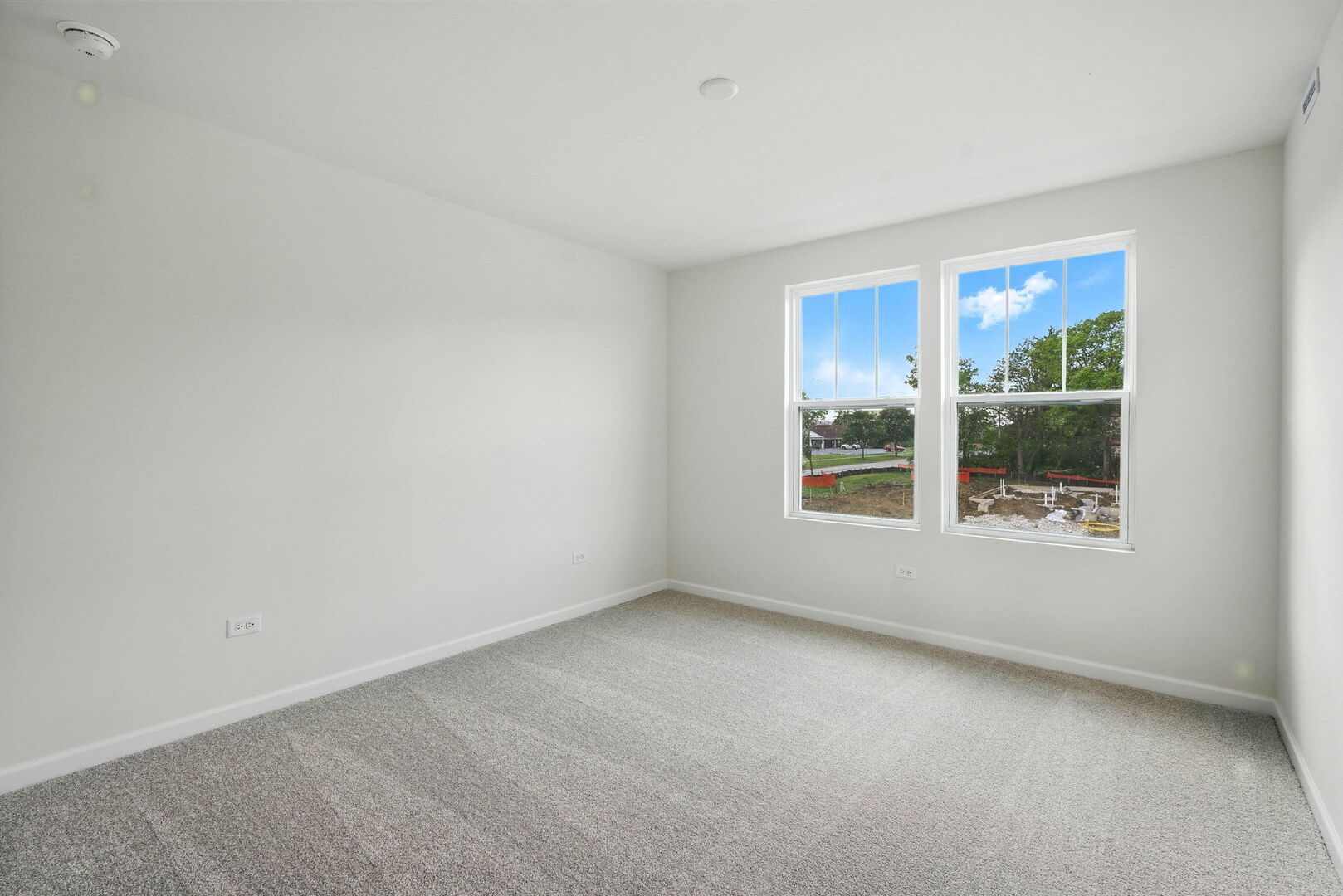 1062 Houston Street, Unit 74004 Batavia, IL 60510 - Photo 22 of 23 a view of an empty room with a window