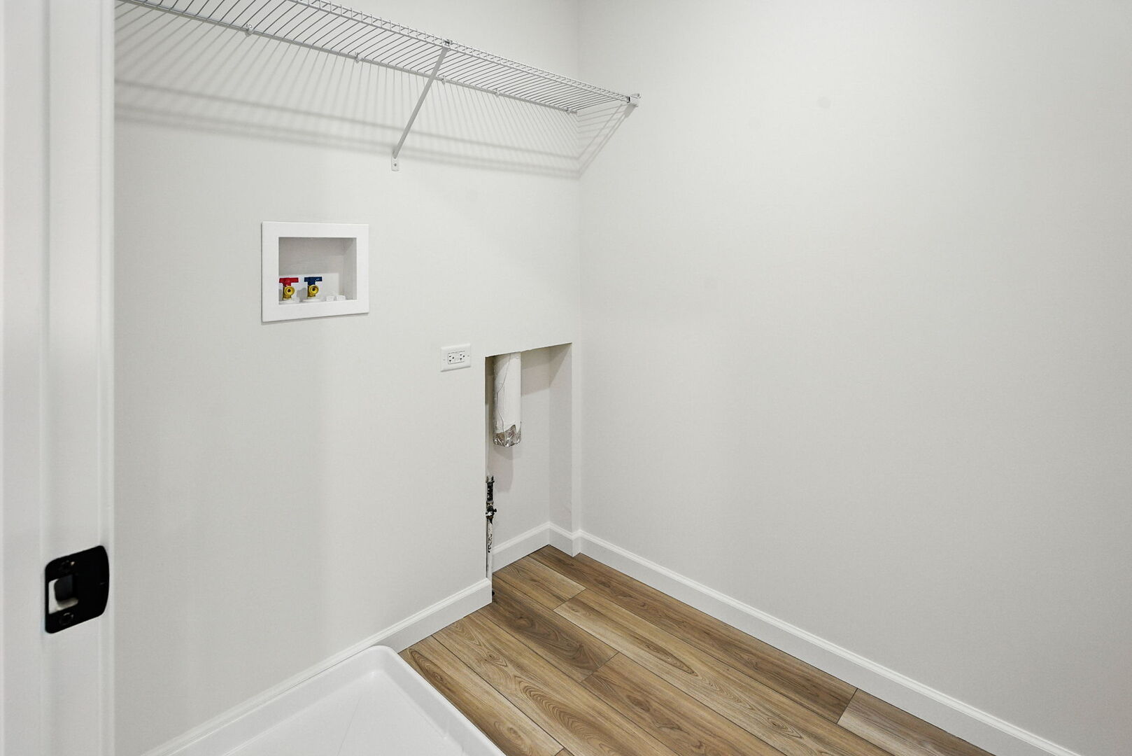 1062 Houston Street, Unit 74004 Batavia, IL 60510 - Photo 23 of 23 a view of small space with racks on the wall