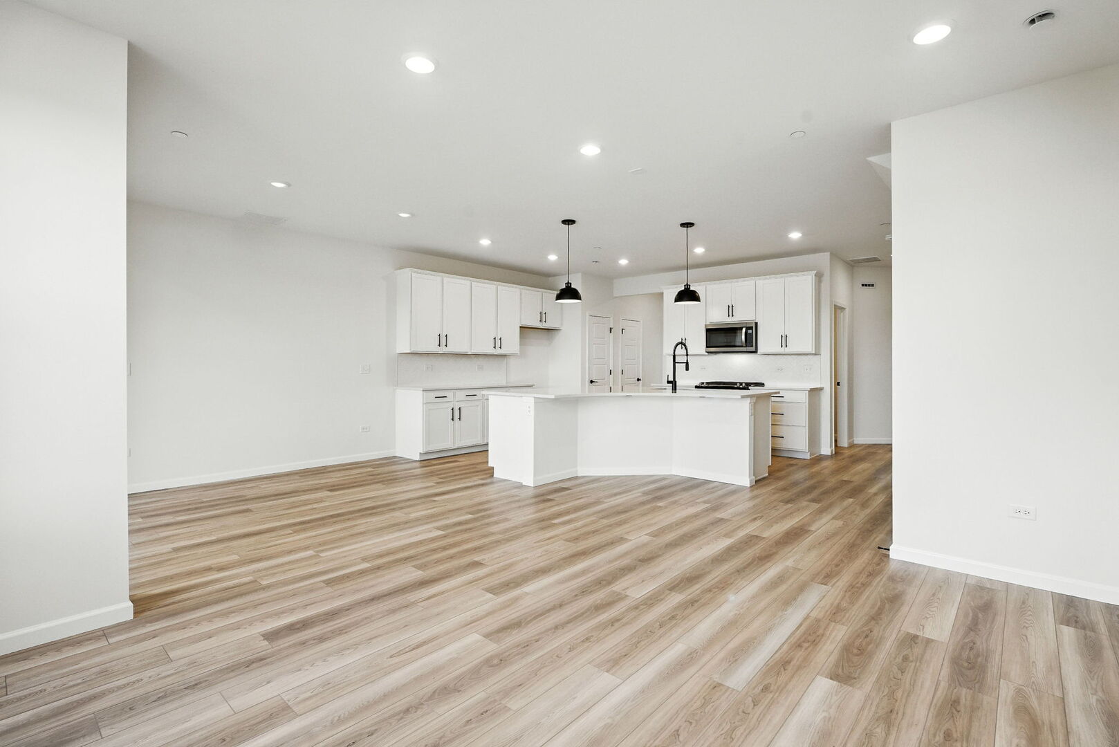 1062 Houston Street, Unit 74004 Batavia, IL 60510 - Photo 9 of 23 a view of kitchen with wooden floor