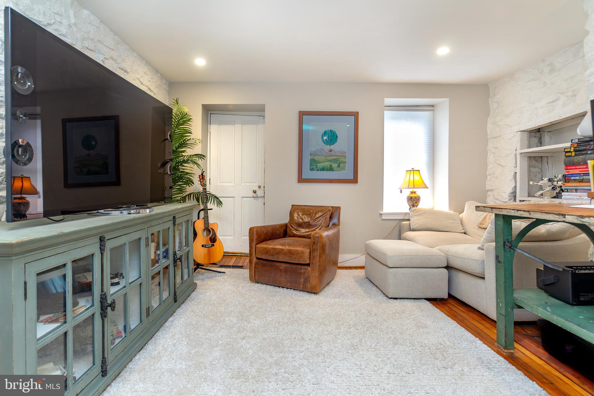 10108 Falls Road Lutherville-Timonium, MD 21093 - Photo 38 of 55 a bedroom with furniture and a window