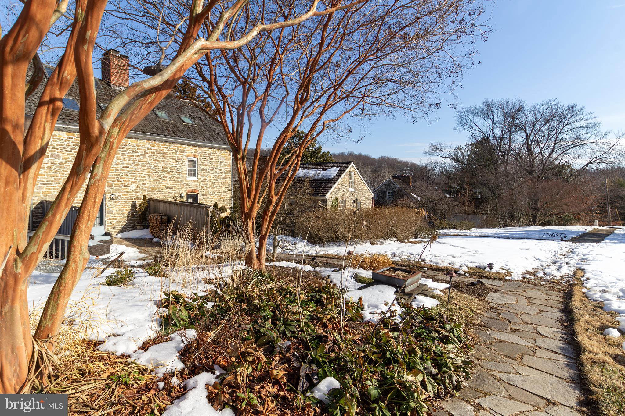 10108 Falls Road Lutherville-Timonium, MD 21093 - Photo 50 of 55 a view of yard covered with snow in front of house
