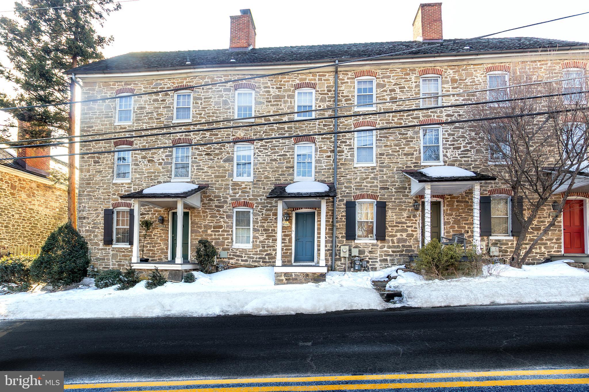 10108 Falls Road Lutherville-Timonium, MD 21093 - Photo 54 of 55 a front view of a residential apartment building with a yard