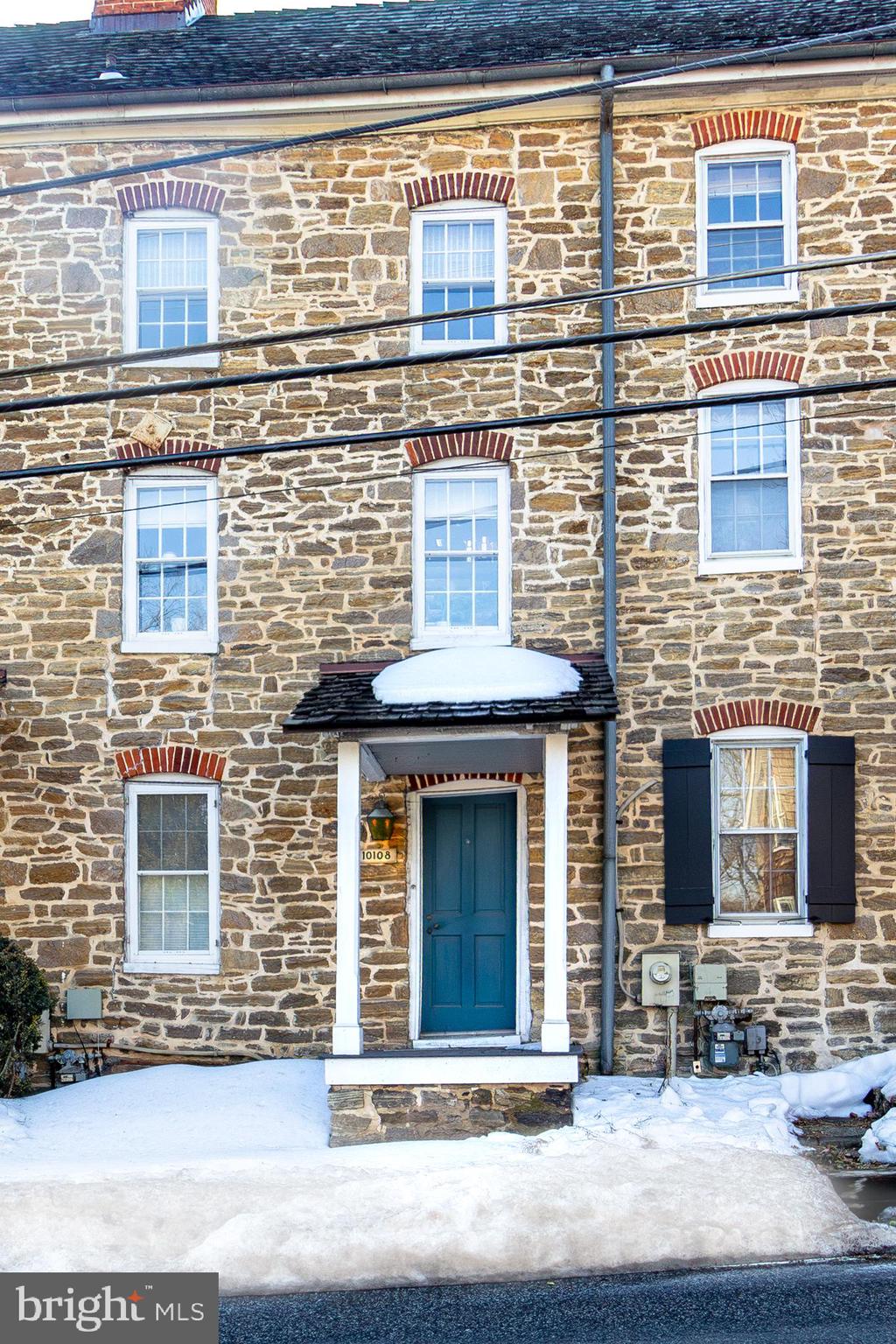 10108 Falls Road Lutherville-Timonium, MD 21093 - Photo 55 of 55 a front view of a building with a street