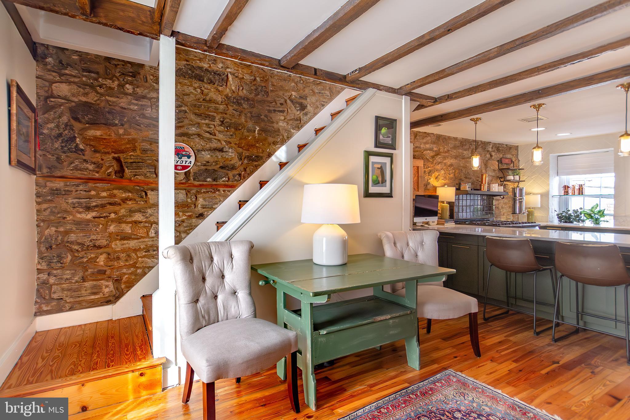 10108 Falls Road Lutherville-Timonium, MD 21093 - Photo 6 of 55 a living room with furniture and a wooden floor