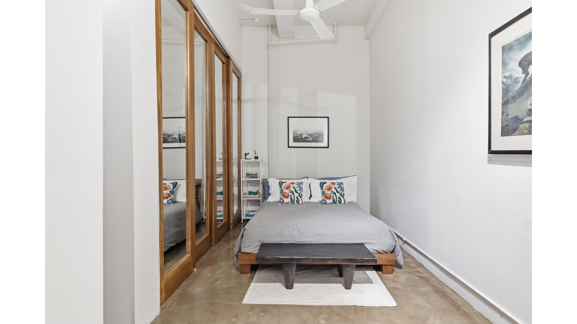 448 West 37th Street, Unit 9G Manhattan, NY 10018 - Photo 13 of 15 a room with a table and a potted plant
