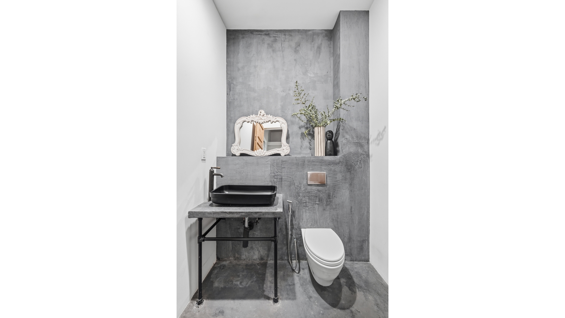 448 West 37th Street, Unit 9G Manhattan, NY 10018 - Photo 14 of 15 a bathroom with a toilet a sink and a mirror
