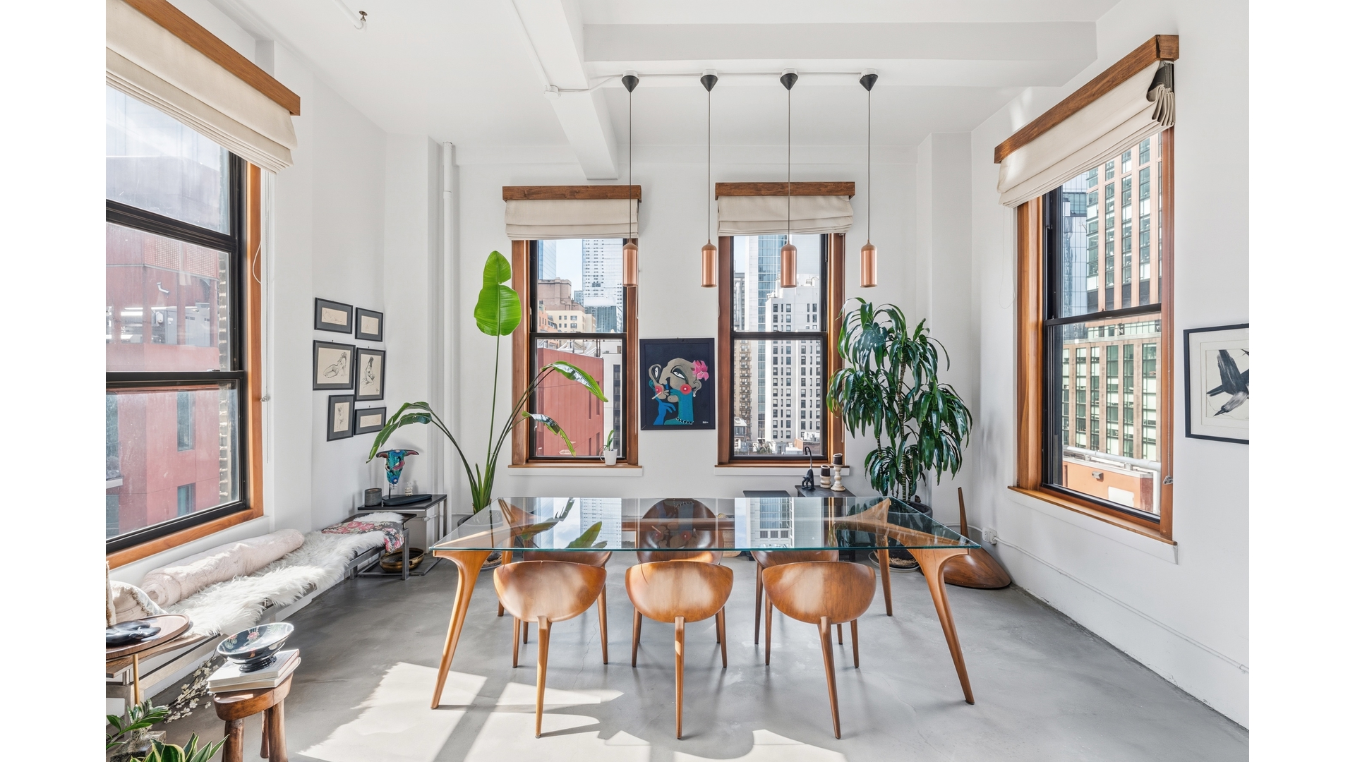 448 West 37th Street, Unit 9G Manhattan, NY 10018 - Photo 3 of 15 a living room with furniture and a window