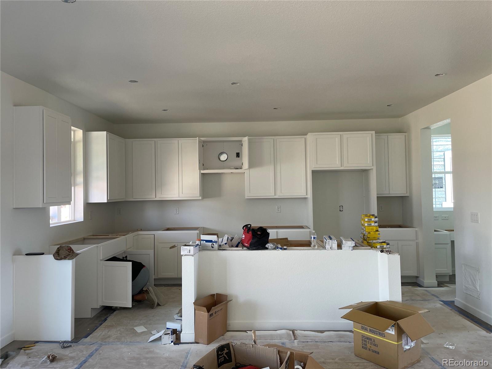 743 Clover Loop Erie, CO 80026 - Photo 2 of 15 a room with storage and utility