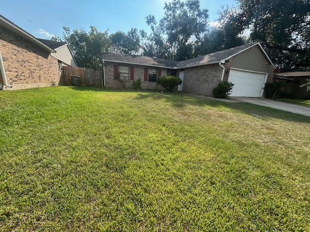 22831 Millgate Drive Spring, TX 77373 - Photo 6 of 9 a view of a house with a yard