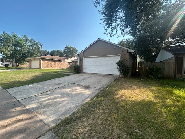 22831 Millgate Drive Spring, TX 77373 - Photo 9 of 9 a view of a house with a yard and garage