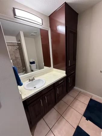 a bathroom with a bathtub and a toilet