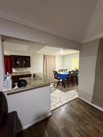 a room with furniture and a flat screen tv