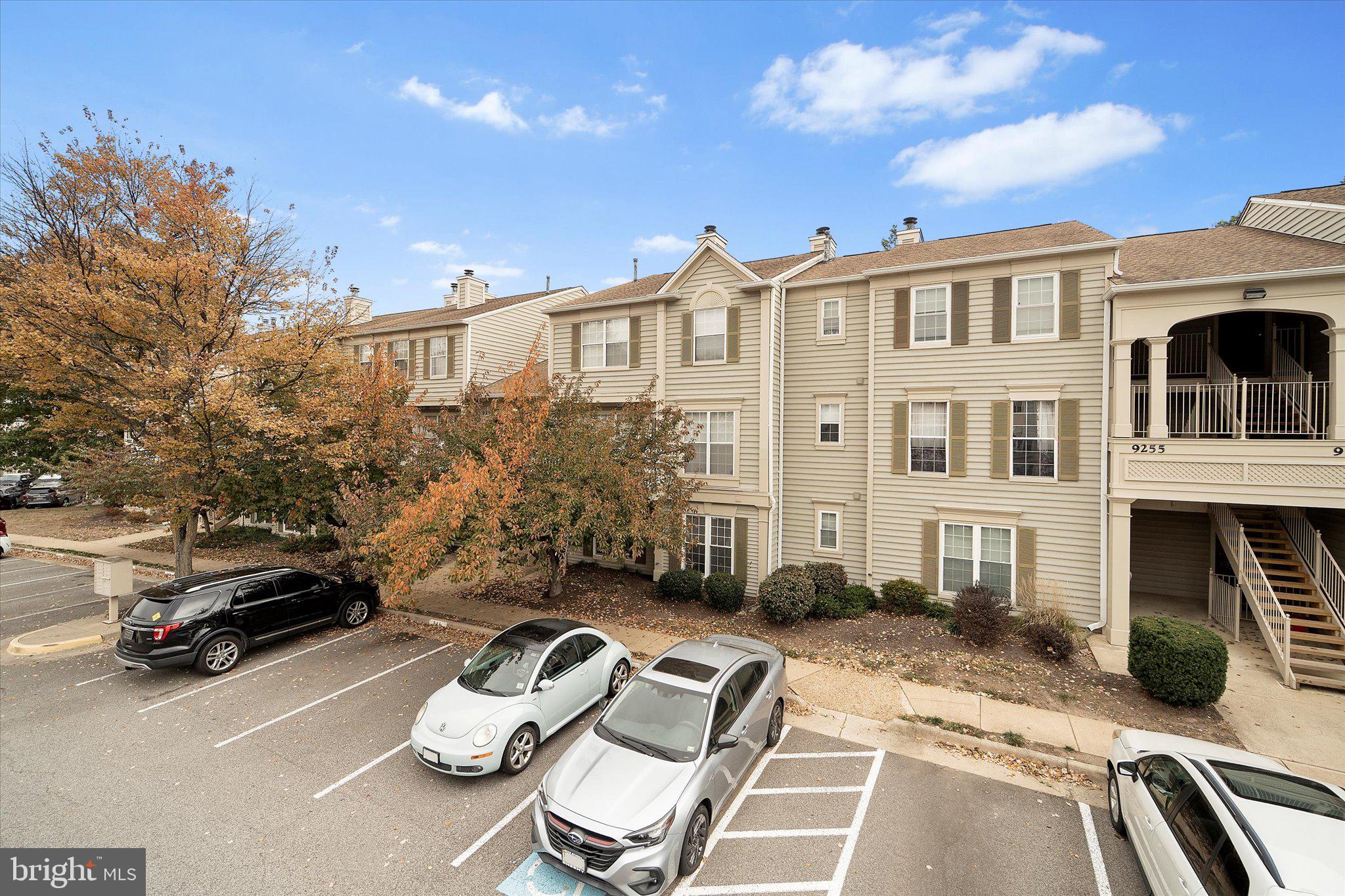 9253 Cardinal Forest Lane, Unit 101 Lorton, VA 22079 - Photo 25 of 29 a view of a car park in front of a building