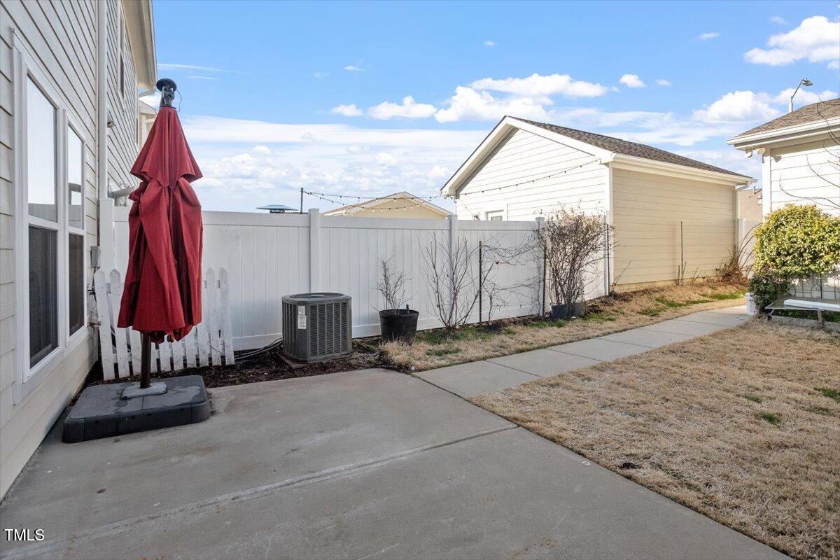 6623 Academic Avenue Raleigh, NC 27616 - Photo 31 of 50 Back Patio Leading to Detached Garage
