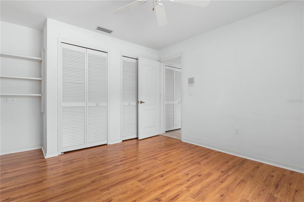 2810 89th Avenue East Parrish, FL 34219 - Photo 23 of 34 a view of empty room with wooden floor