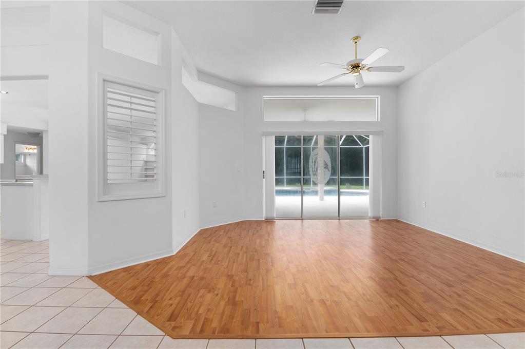 2810 89th Avenue East Parrish, FL 34219 - Photo 4 of 34 a view of an empty room with glass door