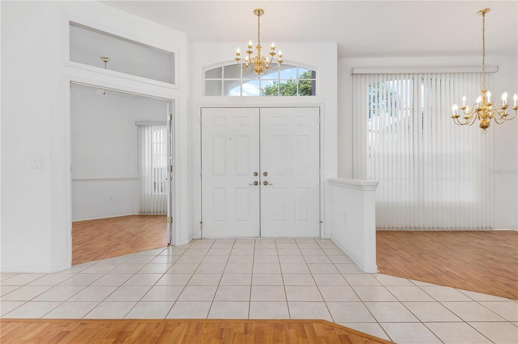 2810 89th Avenue East Parrish, FL 34219 - Photo 8 of 34 wooden floor in an empty room with a window