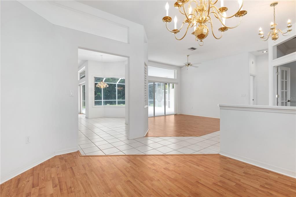 2810 89th Avenue East Parrish, FL 34219 - Photo 9 of 34 a view of an entryway with wooden floor
