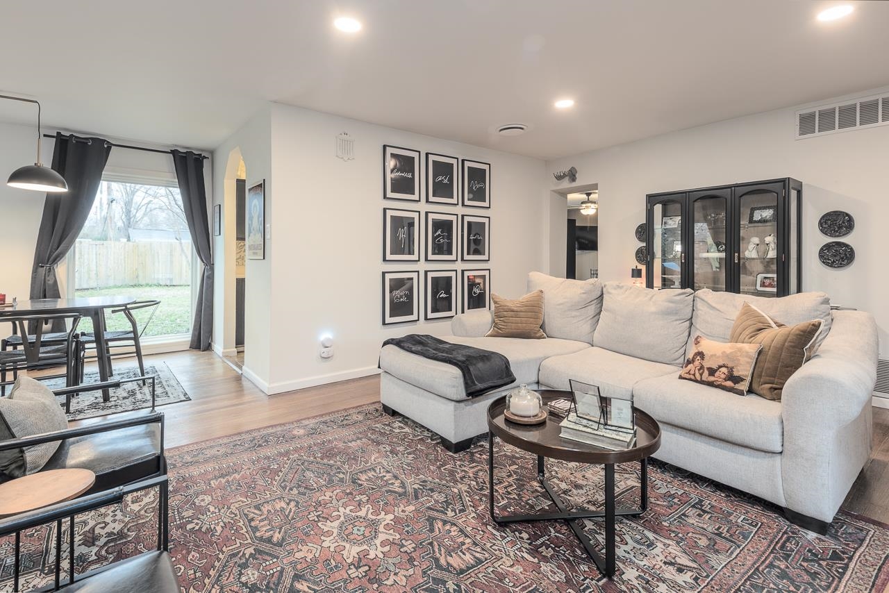 4964 Helene Road Memphis, TN 38117 - Photo 7 of 18 a living room with furniture and a wooden floor