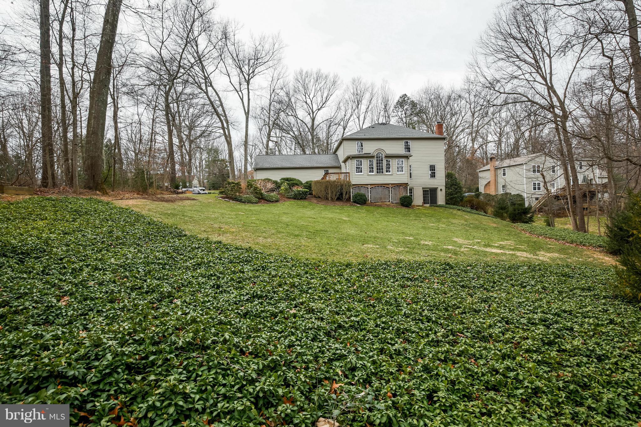 11006 Birdfoot Court Reston, VA 20191 - Photo 27 of 30 a view of a house with a yard