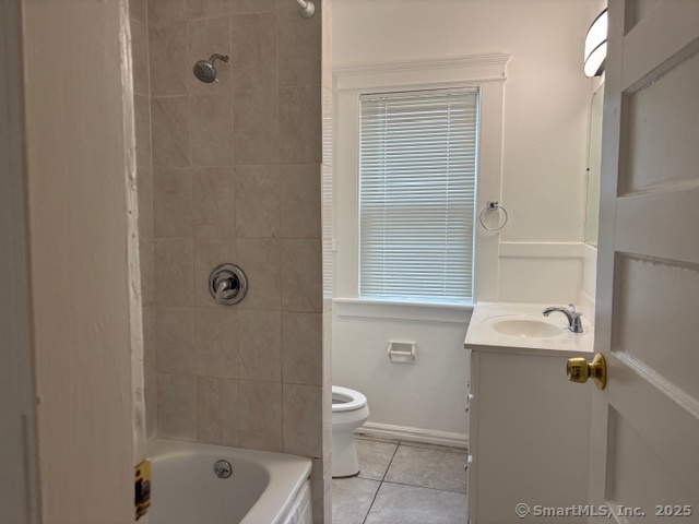 64 Wade Street, Unit 1 Bridgeport, CT 06604 - Photo 13 of 22 a bathroom with a sink toilet and shower
