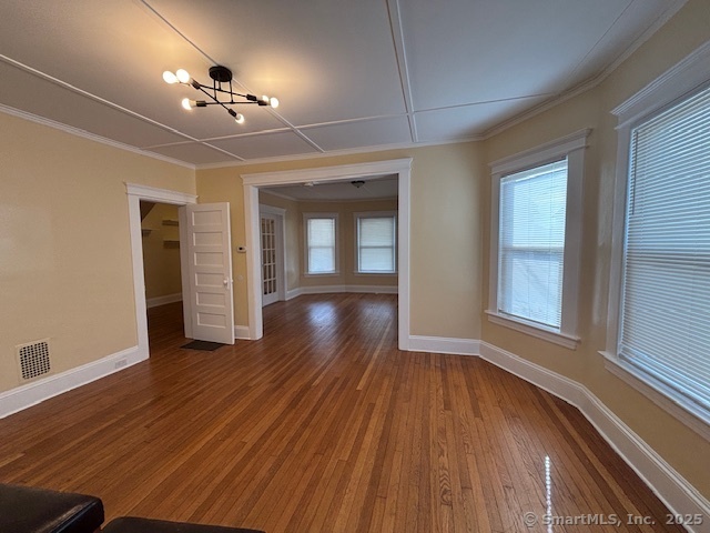64 Wade Street, Unit 1 Bridgeport, CT 06604 - Photo 17 of 22 a view of empty room with wooden floor and fan