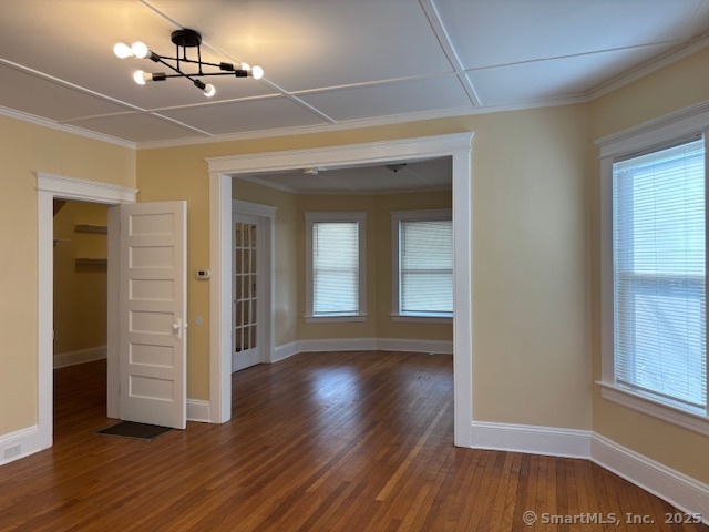 64 Wade Street, Unit 1 Bridgeport, CT 06604 - Photo 20 of 22 wooden floor in an empty room with a window