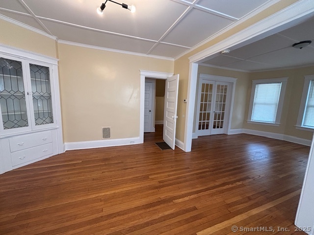 64 Wade Street, Unit 1 Bridgeport, CT 06604 - Photo 22 of 22 a view of an empty room with wooden floor and a window