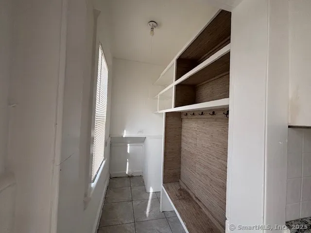 a bathroom with a shower and a toilet