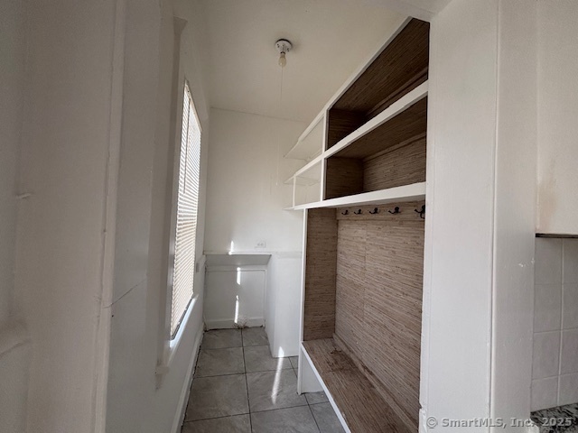 64 Wade Street, Unit 1 Bridgeport, CT 06604 - Photo 7 of 22 a bathroom with a shower and a toilet