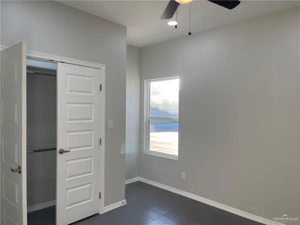 an empty room with a hardwood