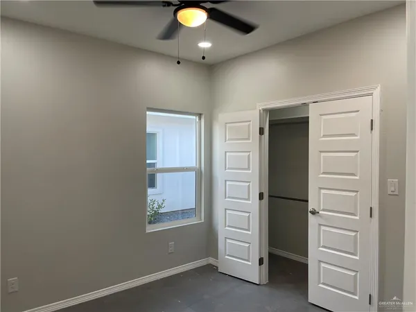 a view of an empty room and window