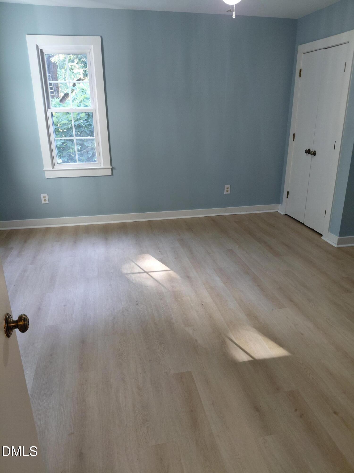 804 Olive Street Apex, NC 27502 - Photo 39 of 60 an empty room with a window