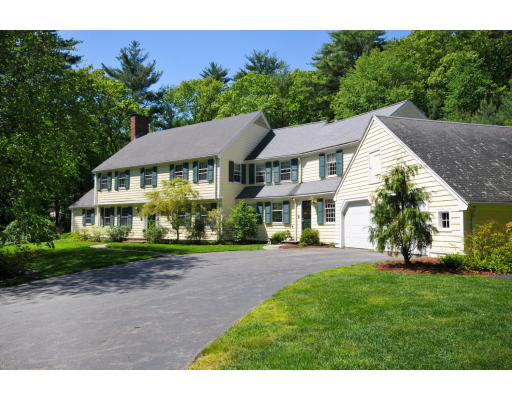 41 Juniper Road Weston, MA 02493 - Photo 1 of 1 a front view of a house with a garden