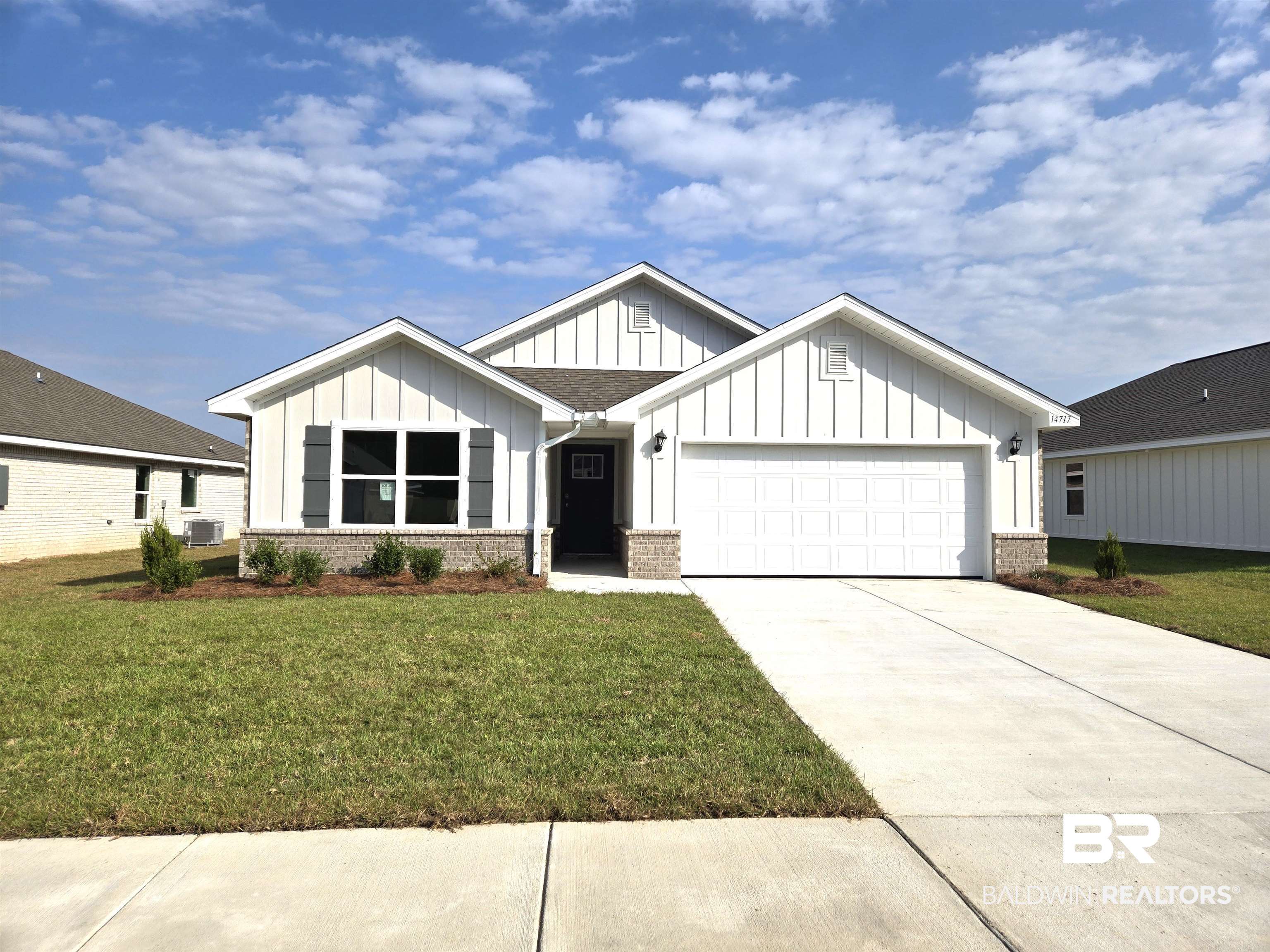 14717 Dayton Circle Foley, AL 36535 - Photo 1 of 39 View of front of home with a front lawn, central air condition unit, and a garage