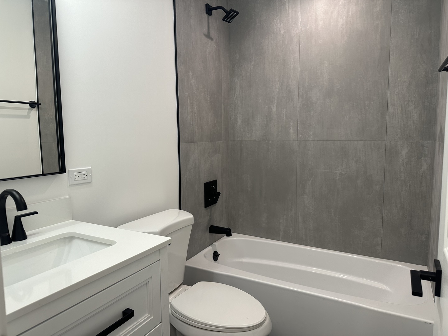 8232 Niles Center Road, Unit 202 Skokie, IL 60077 - Photo 6 of 8 a bathroom with a sink toilet and shower