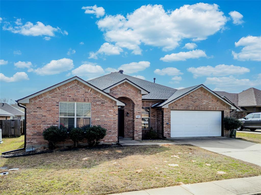 10807 Westhaven Circle Flint, TX 75762 - Photo 1 of 40 Ranch-style house featuring concrete driveway, a front lawn, an attached garage, and brick siding