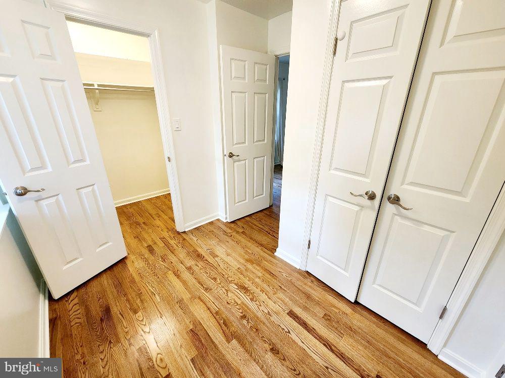 8076 Stillbrooke Road Manassas, VA 20112 - Photo 16 of 18 PRIMARY DRESSING AREA WITH 2 CLOSETS
