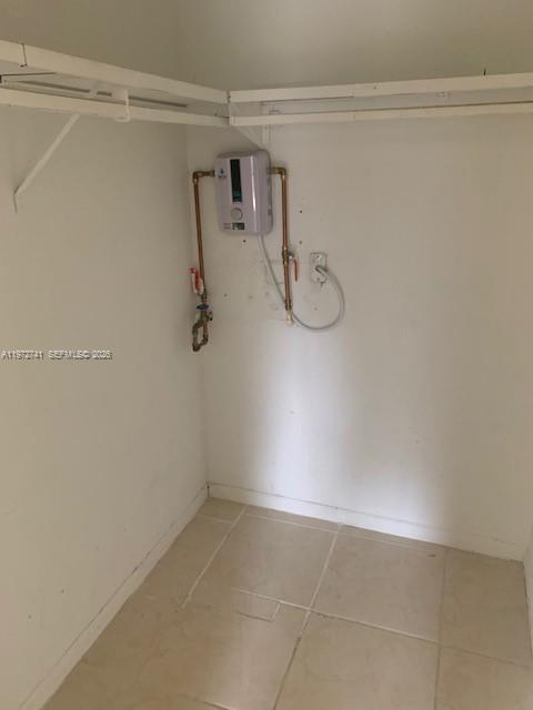 13714 Southwest 90th Avenue, Unit 25 Miami, FL 33176 - Photo 11 of 15 a bathroom with a shower